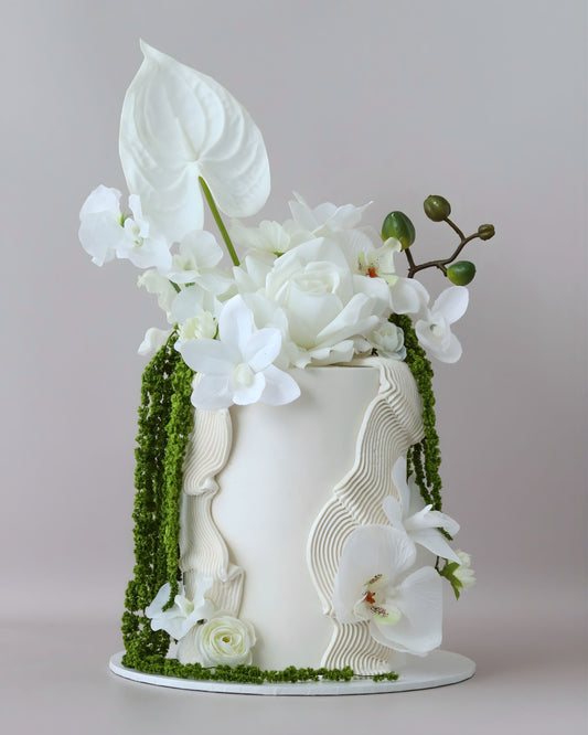 White floral wedding cake with a pop of green foliage and organic squiggles texture - Bel Bear Bakes