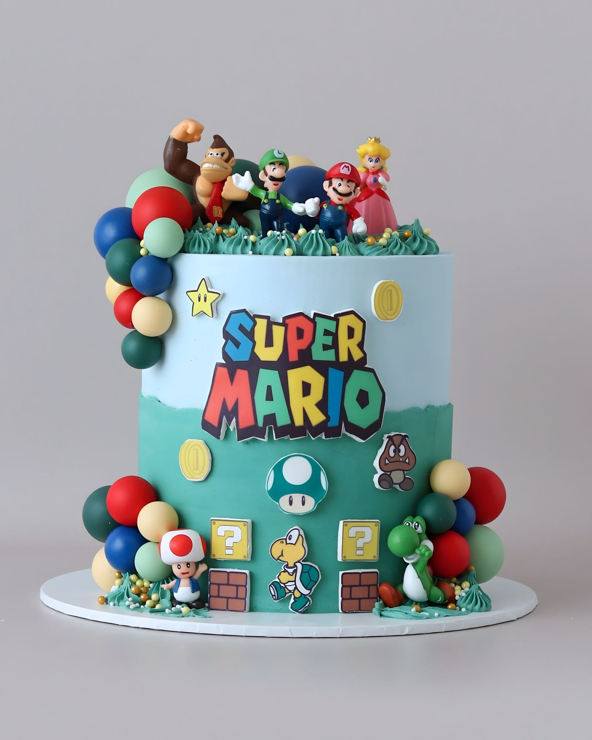 Blue and Green Super Mario Character Cake -  Bel Bear Bakes