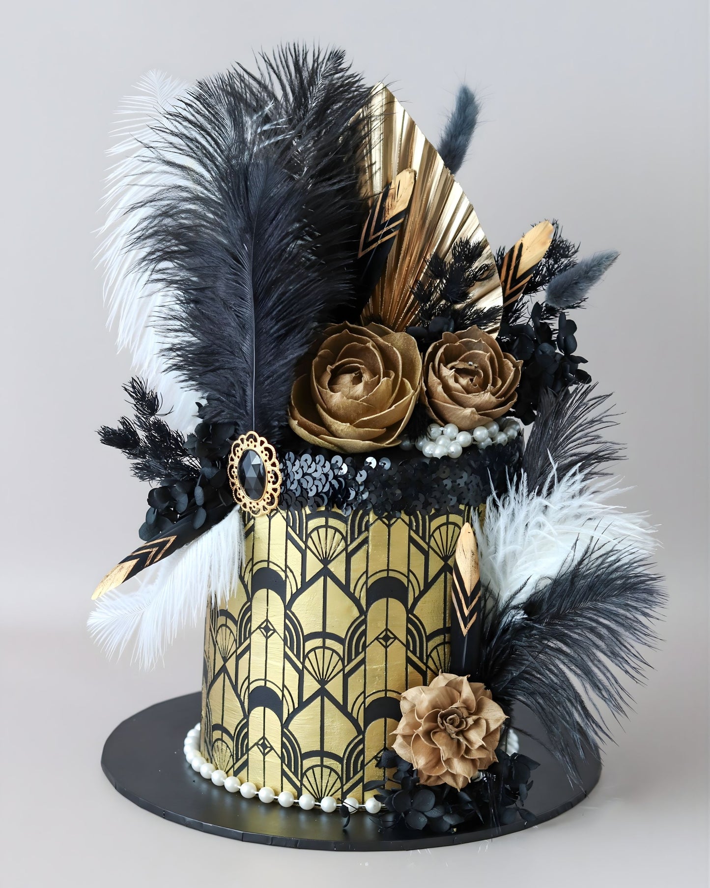 Black & Gold Gatsby Theme Cake with feathers & accessories