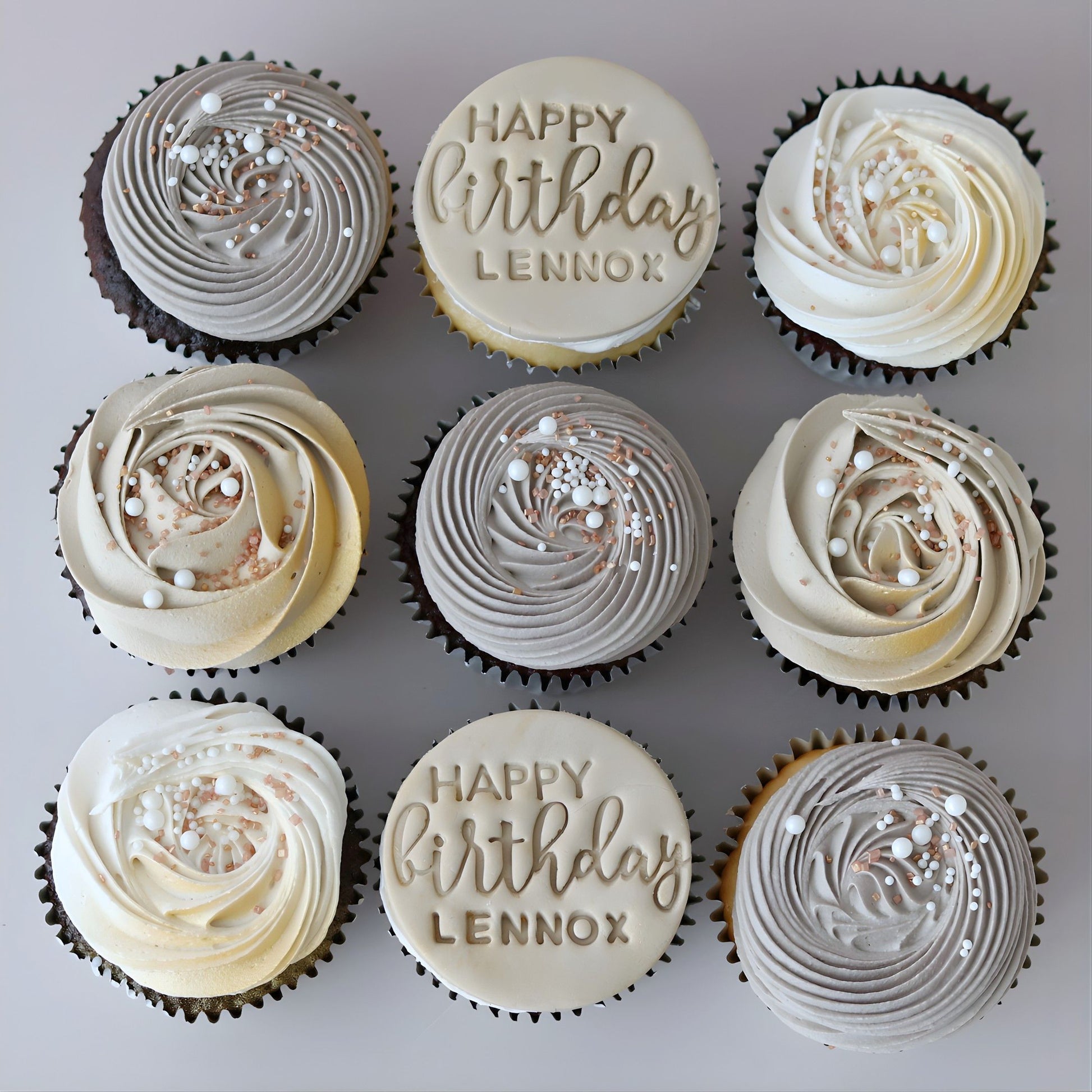 Latte and white Happy Happy Birthday cupcakes with custom name