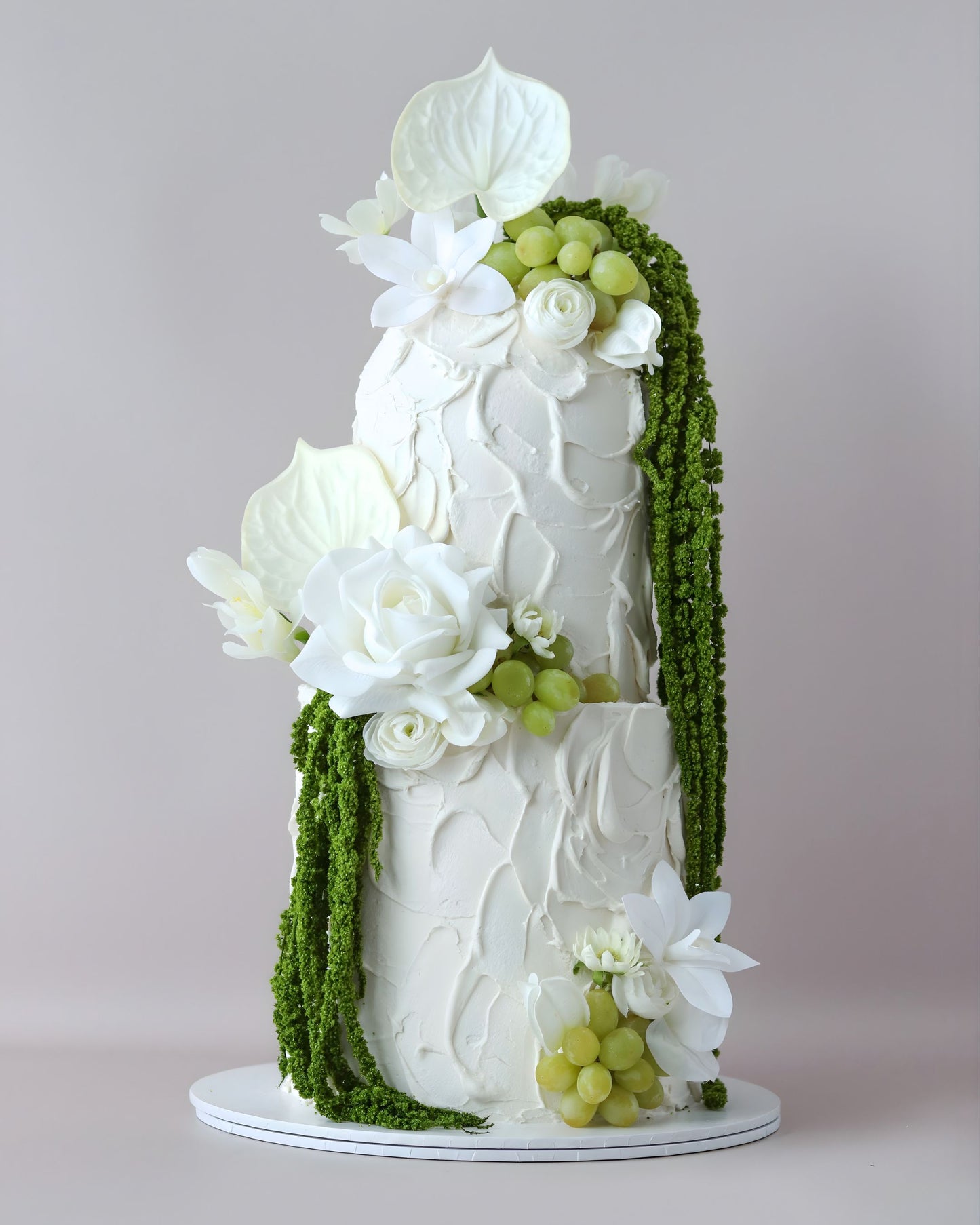 2 tier white and green modern floral wedding dome cake
